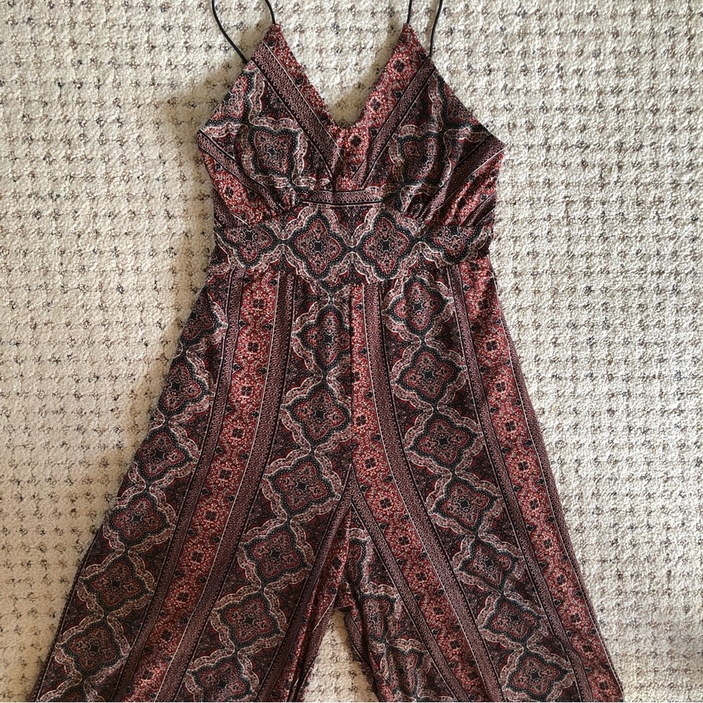 Charlotte Russe jumpsuit. Size large. New with tag.